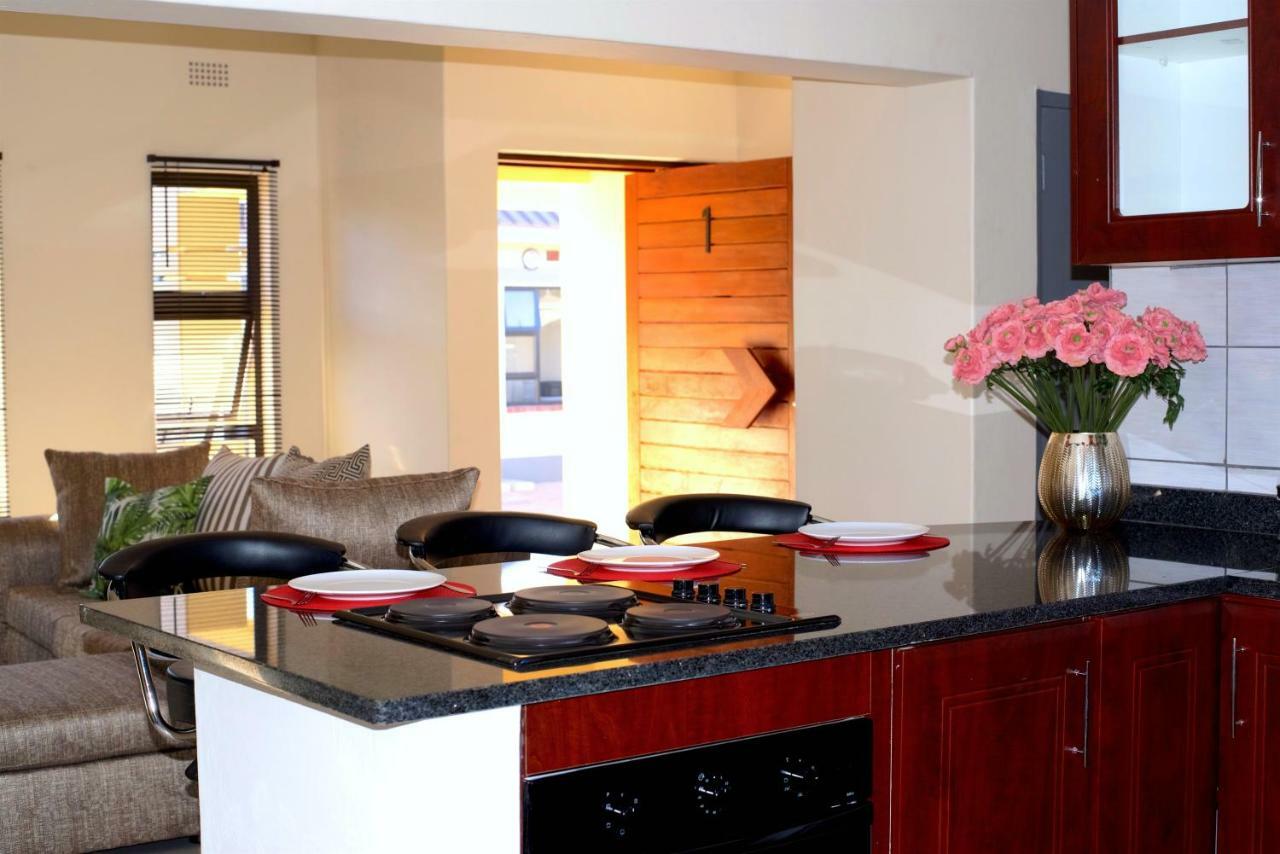 Green Haven Apartments เอซูลวินิ ภายนอก รูปภาพ