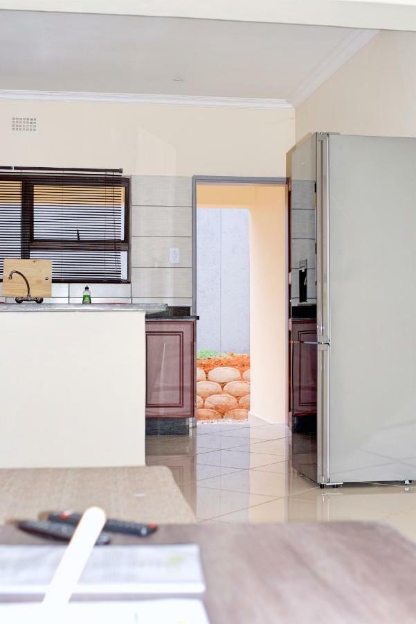 Green Haven Apartments เอซูลวินิ ภายนอก รูปภาพ